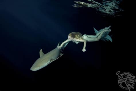 nude underwater swimming